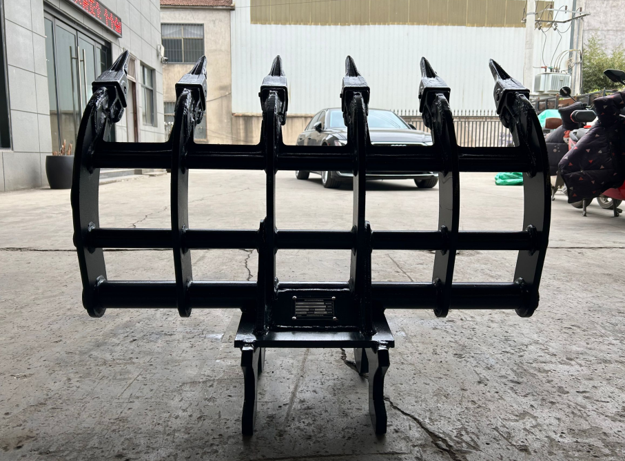 Close-up of 32" Excavator Brush Rake / Root Rake fits 1.5 - 2.5 Ton Excavator with Wedge and Pin Couplers - tough and durable heavy equipment.