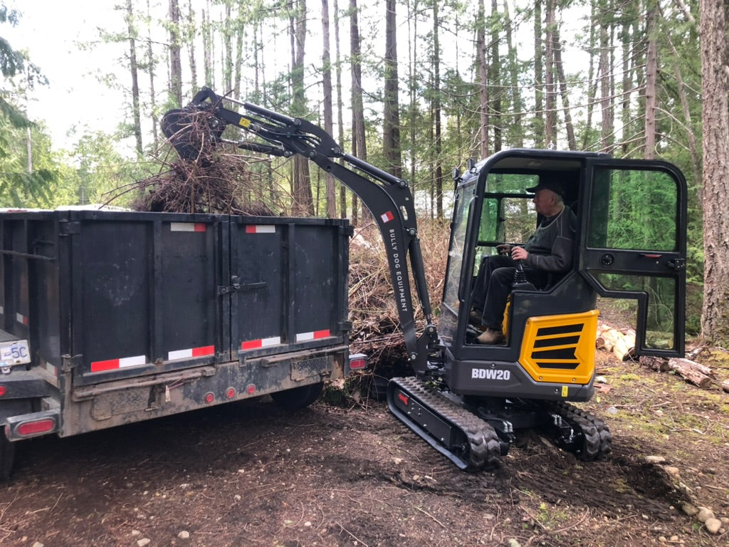 Heavy equipment - 2 Ton Closed Cab Excavator with Kubota Diesel Engine AC and In Cab Heater - Excavator for Sale In BC sold by Bully Dog Equipment.