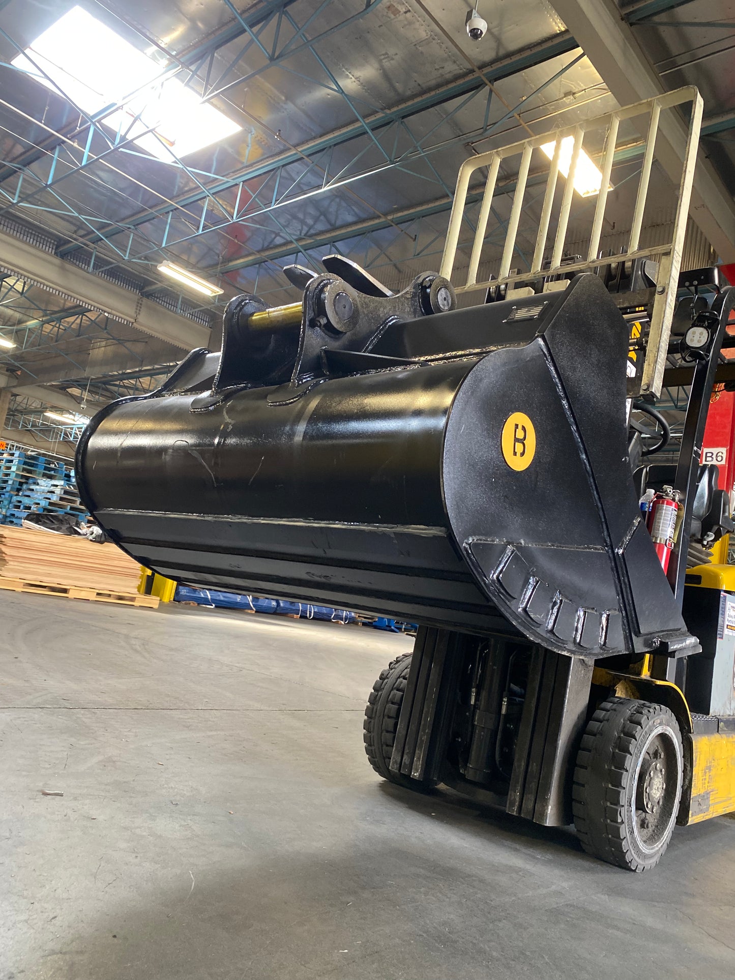 Heavy equipment - 54" Clean up Bucket 12-16 Ton Excavator WBM 120 / CWS 120 / Cat pins sold by Bully Dog Equipment.