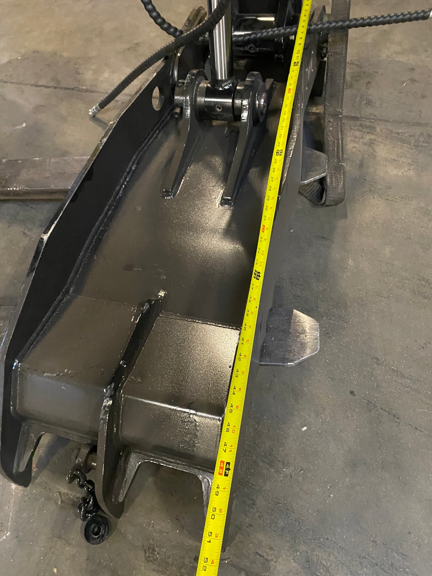 Close-up of 45" Hydraulic Thumb for 8 - 12 Ton Excavator - tough and durable heavy equipment.